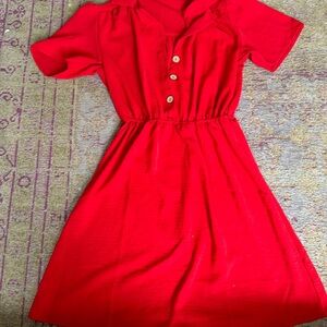 Red Joie de Vivre dress.